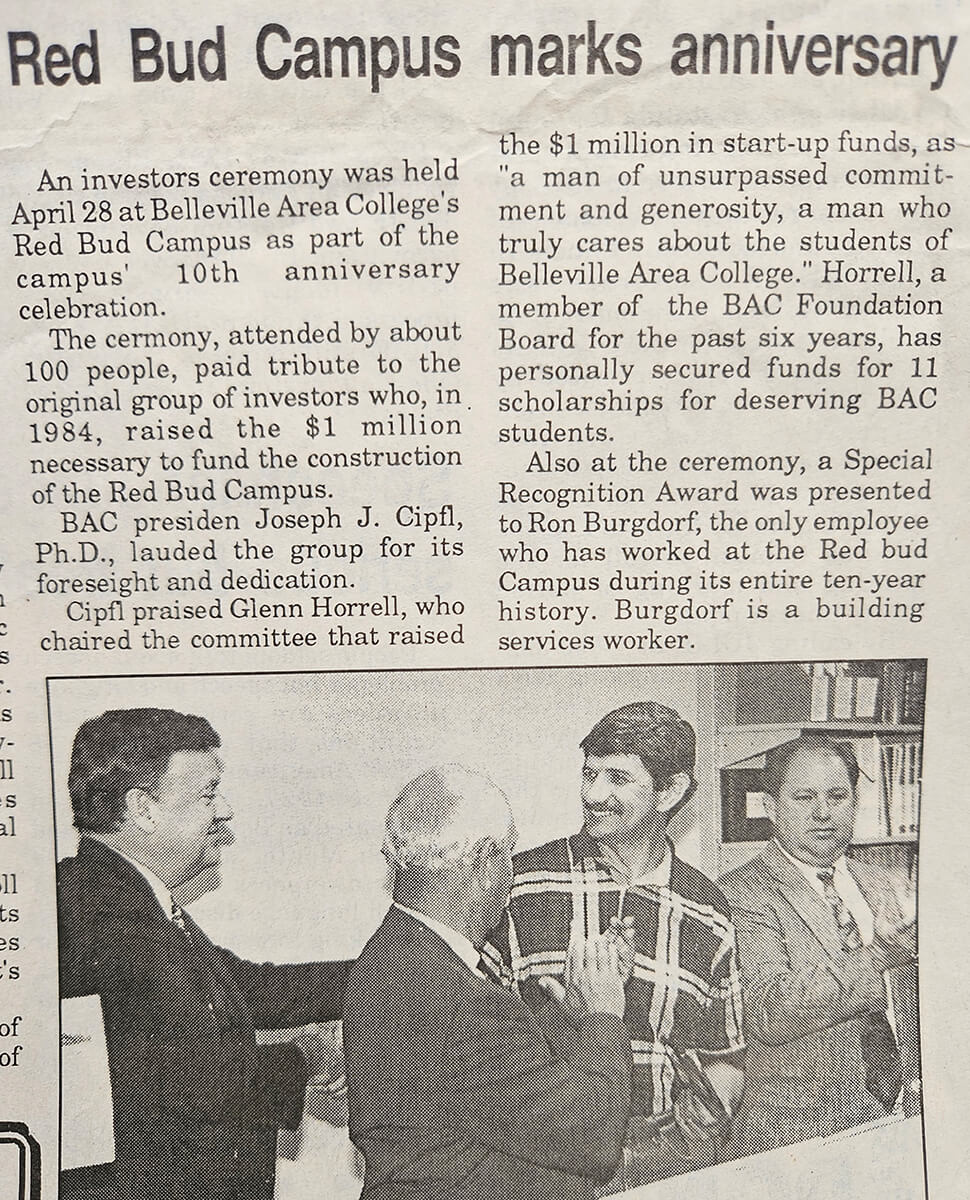 Newspaper Headline: Red Bud Campus Marks Anniversary